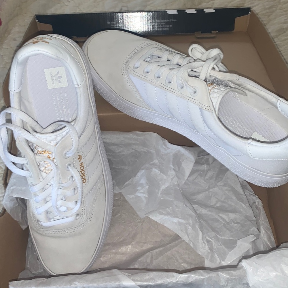 Beautiful white adidas sneakers. Won’t once.